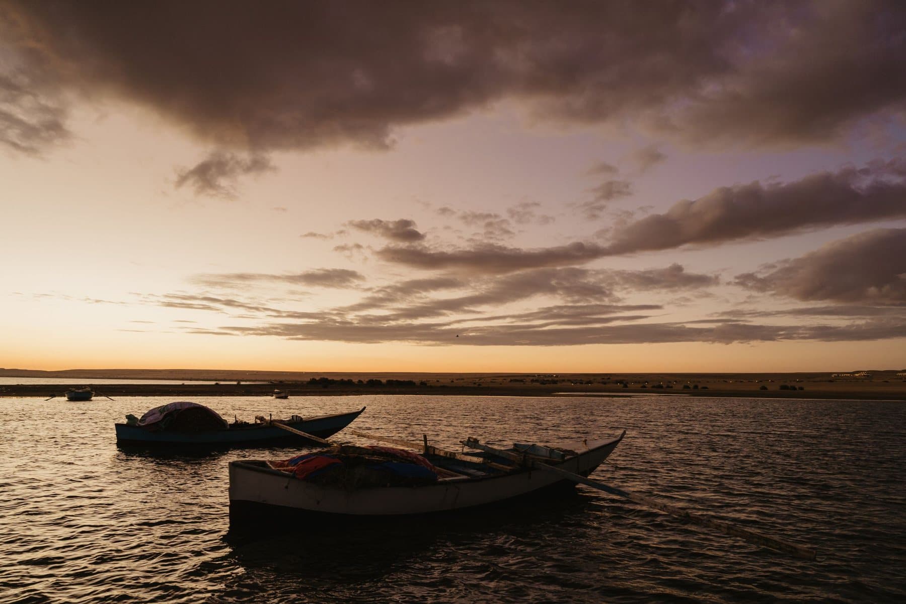 Fishing boats on Lake Qarun at sunset