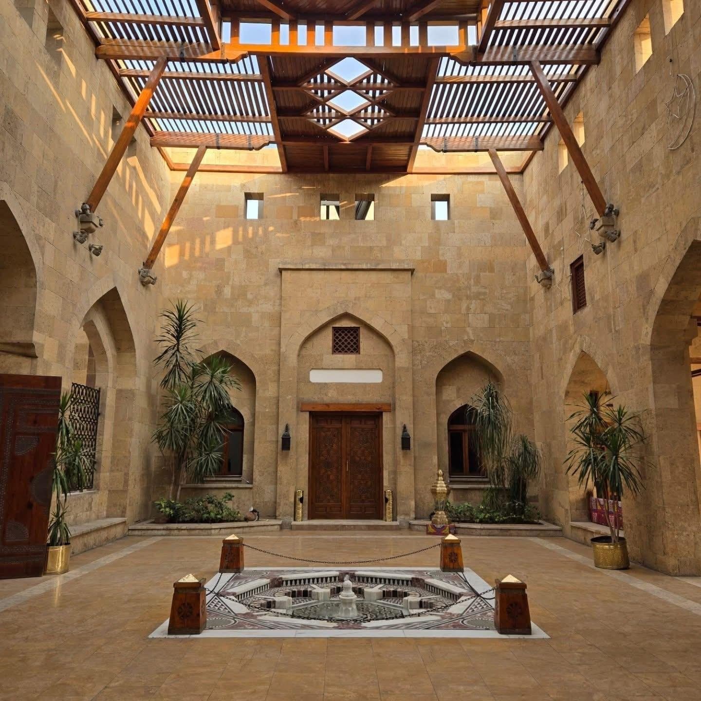 A carved wooden courtyard in a historic Cairo house