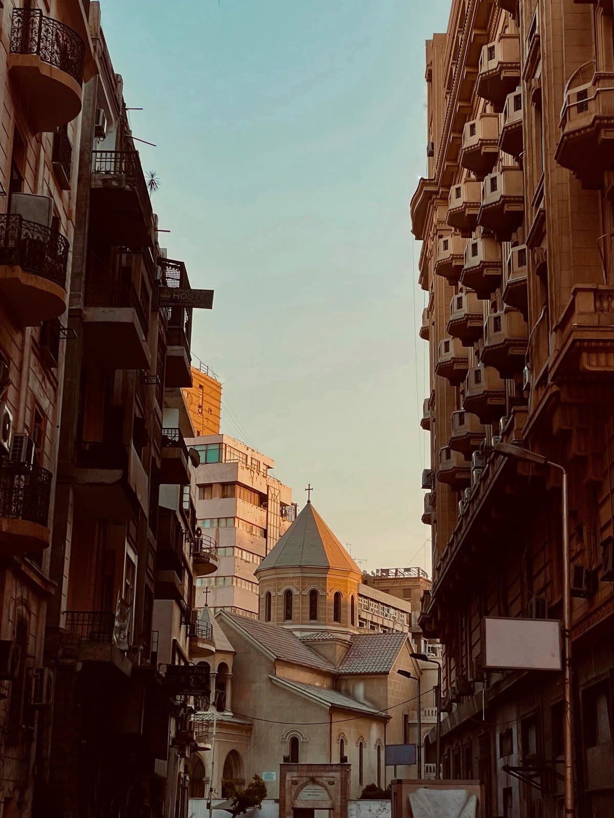 A church dome between the old buildings of downtown Cairo