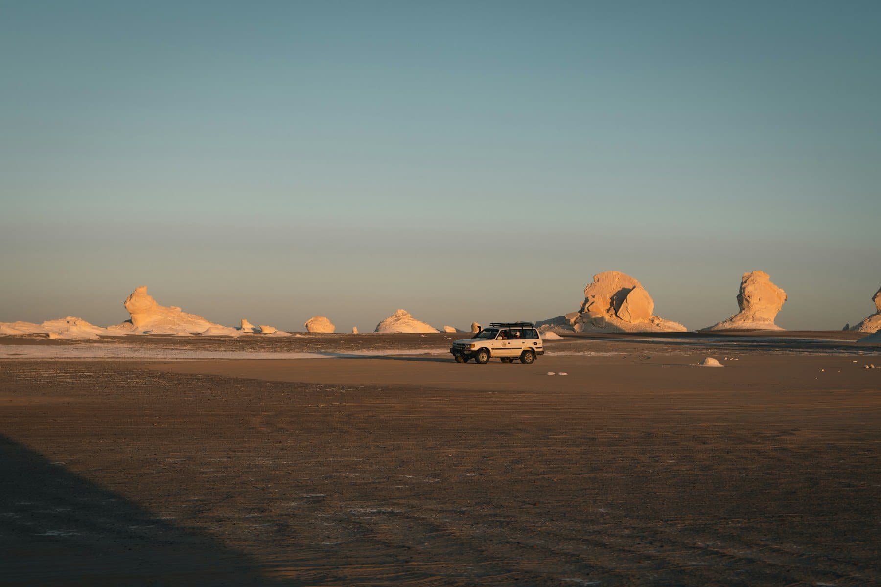 Chalk formations of the White Desert at golden hour